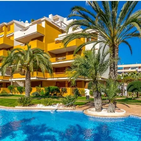Lägenhet Espana - Punta Prima Orihuela Costa - Large For 6-people 85m2 And Terrace 40m2 Air Conditioning Wi-fi Living Kitchen 2 Bedrooms 2 Bathrooms 3 Swimming Pools Parking Security To The Sea 200m Only 40 Min To The Airport