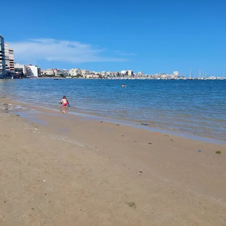 Lejlighed Espana - Punta Prima Orihuela Costa - Large For 6-people 85m2 And Terrace 40m2 Air Conditioning Wi-fi Living Kitchen 2 Bedrooms 2 Bathrooms 3 Swimming Pools Parking Security To The Sea 200m Only 40 Min To The Airport *