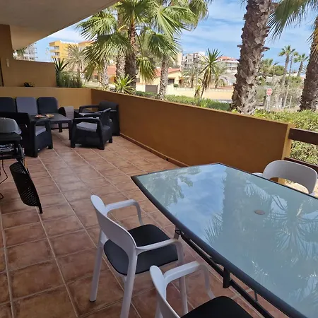 Lägenhet Espana - Punta Prima Orihuela Costa - Large For 6-people 85m2 And Terrace 40m2 Air Conditioning Wi-fi Living Kitchen 2 Bedrooms 2 Bathrooms 3 Swimming Pools Parking Security To The Sea 200m Only 40 Min To The Airport Torrevieja