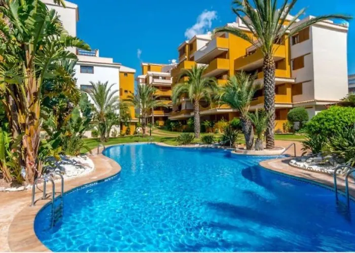 Espana - Punta Prima Orihuela Costa - Large For 6-people 85m2 And Terrace 40m2 Air Conditioning Wi-fi Living Kitchen 2 Bedrooms 2 Bathrooms 3 Swimming Pools Parking Security To The Sea 200m Only 40 Min To The Airport *
